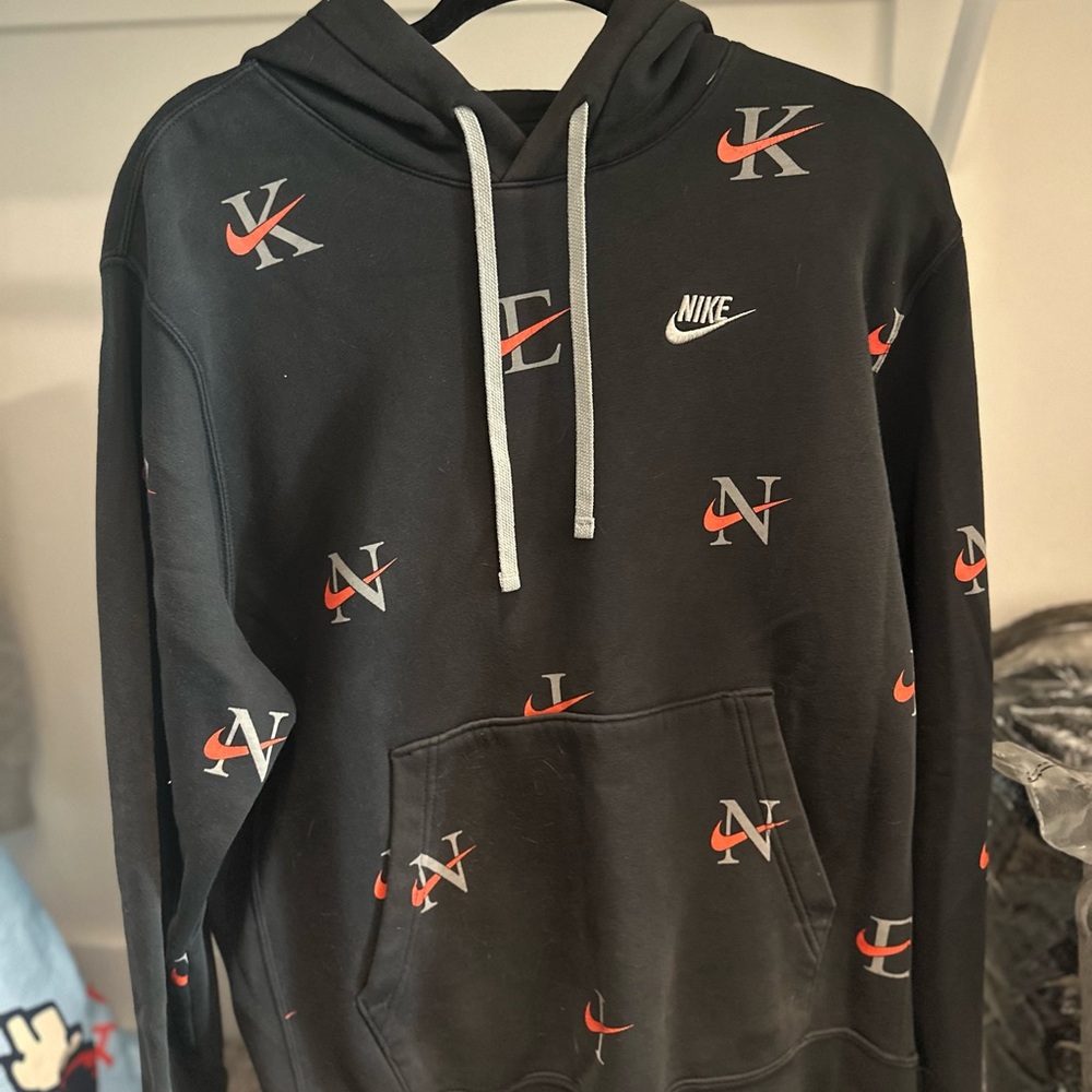 Nike Black Hoodie with Red and White Logo Pattern